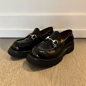 Black Patent Leather Loafers with Silver Buckle